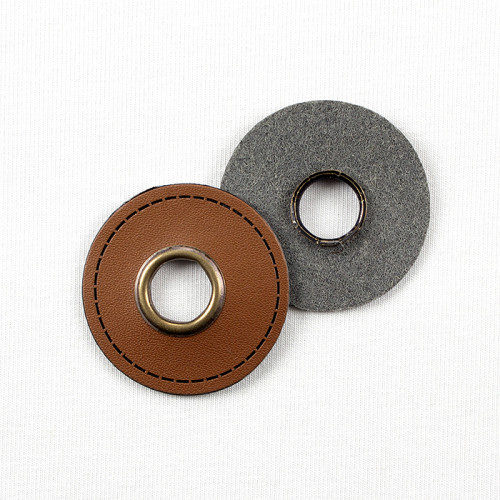 Eyelets on cognac faux leather round 10mm