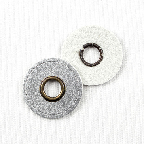 Eyelets on silver faux leather round 10mm